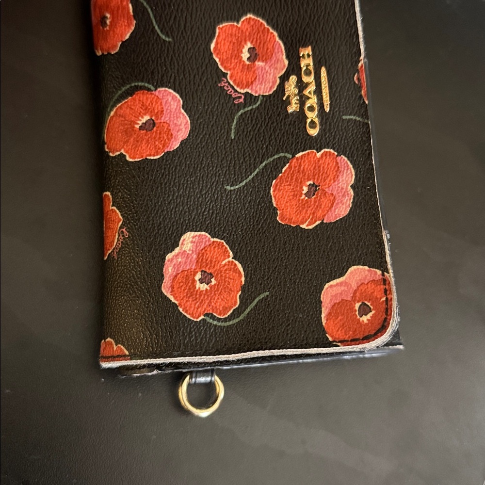 COACH bifold wallet with cute poppy print. Change pocket in back. Snap closure. - Picture 11 of 16